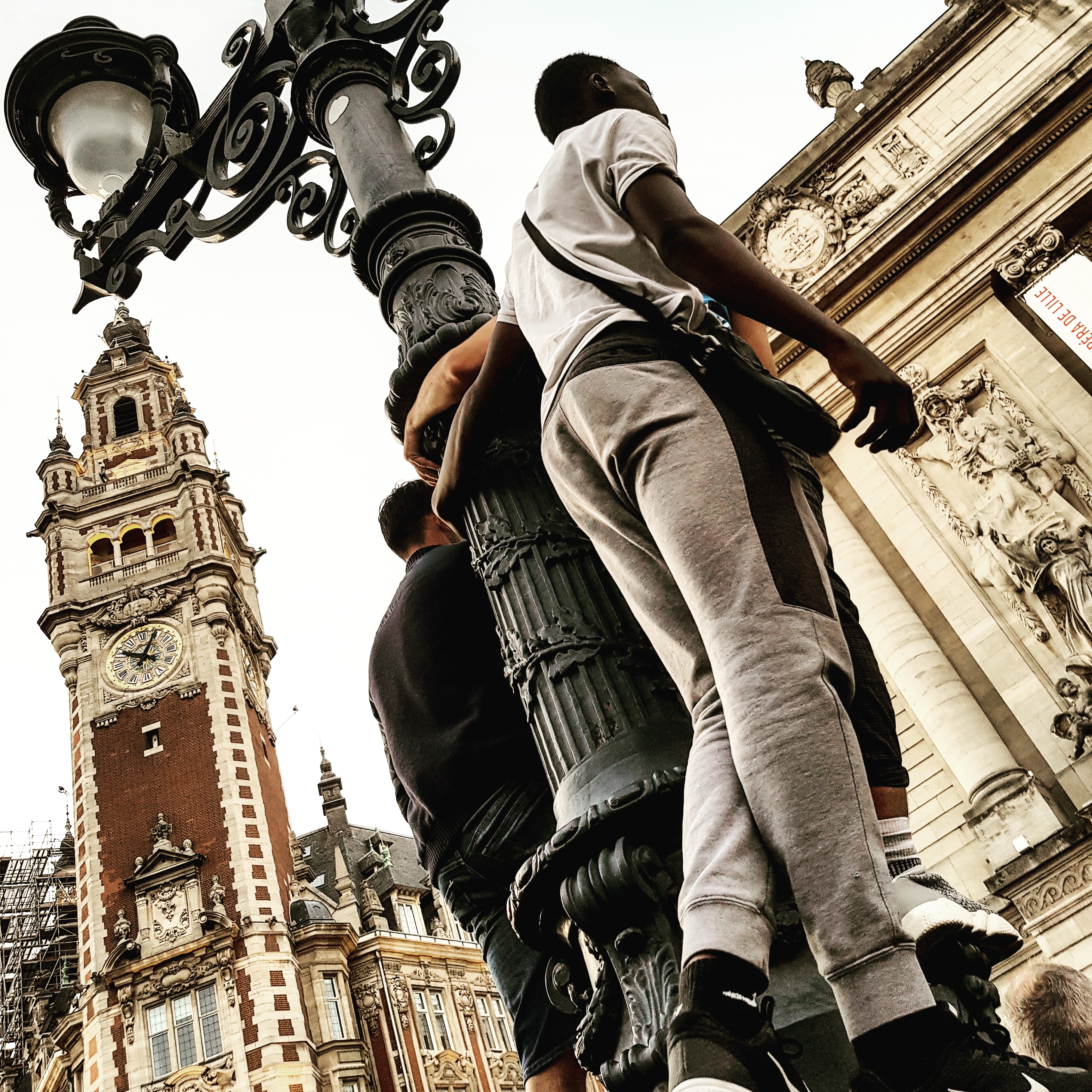 fête de la musique boys on lamppost fête de la musique boys on lamppost